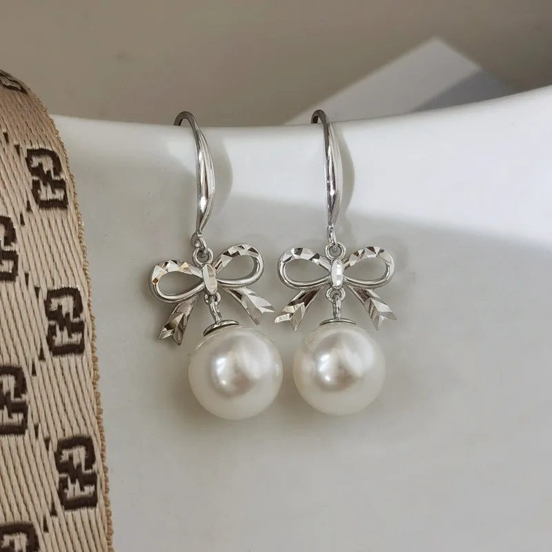 

S925 Small fresh new silver earrings cute wind bow earrings temperament female long pearl ear hang S925