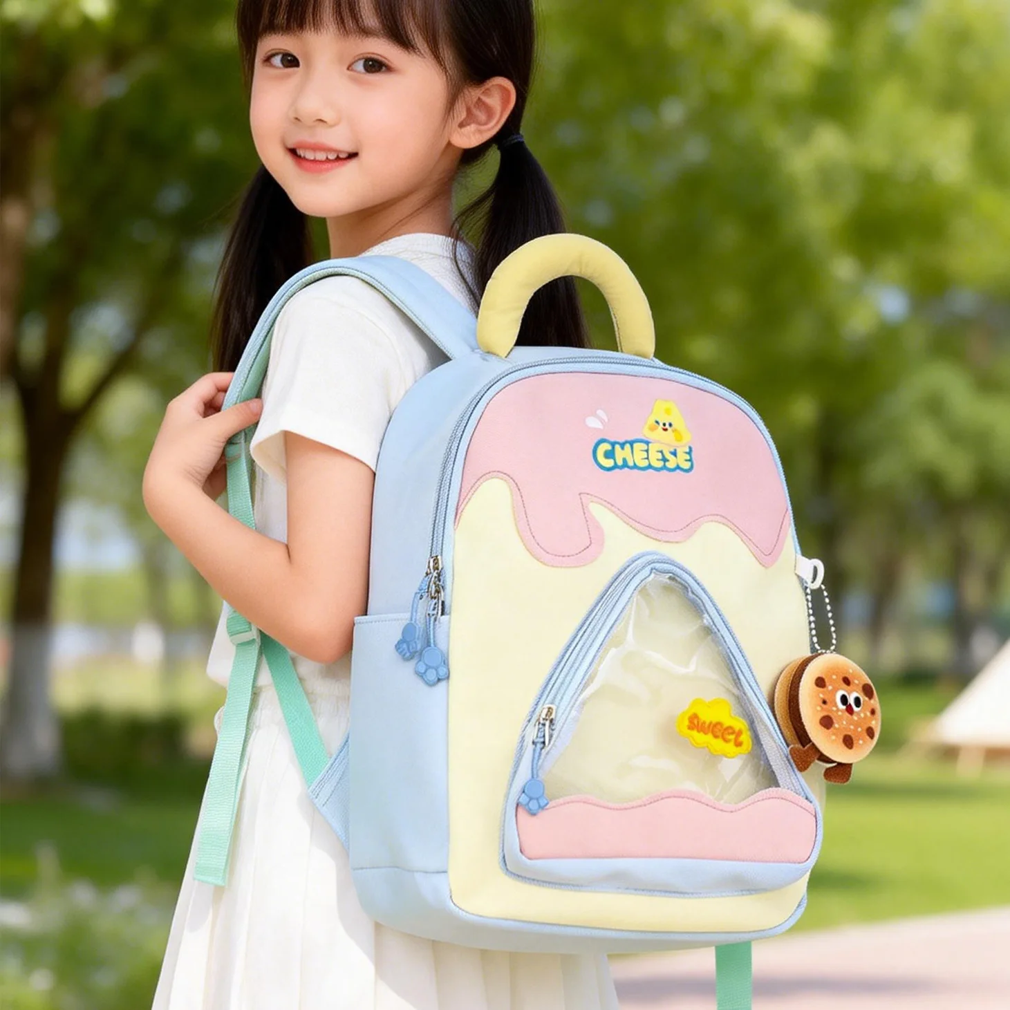 Compact nylon student backpack with cute cartoon pendant, color-coordinated and kawaii, waterproof children's backpack