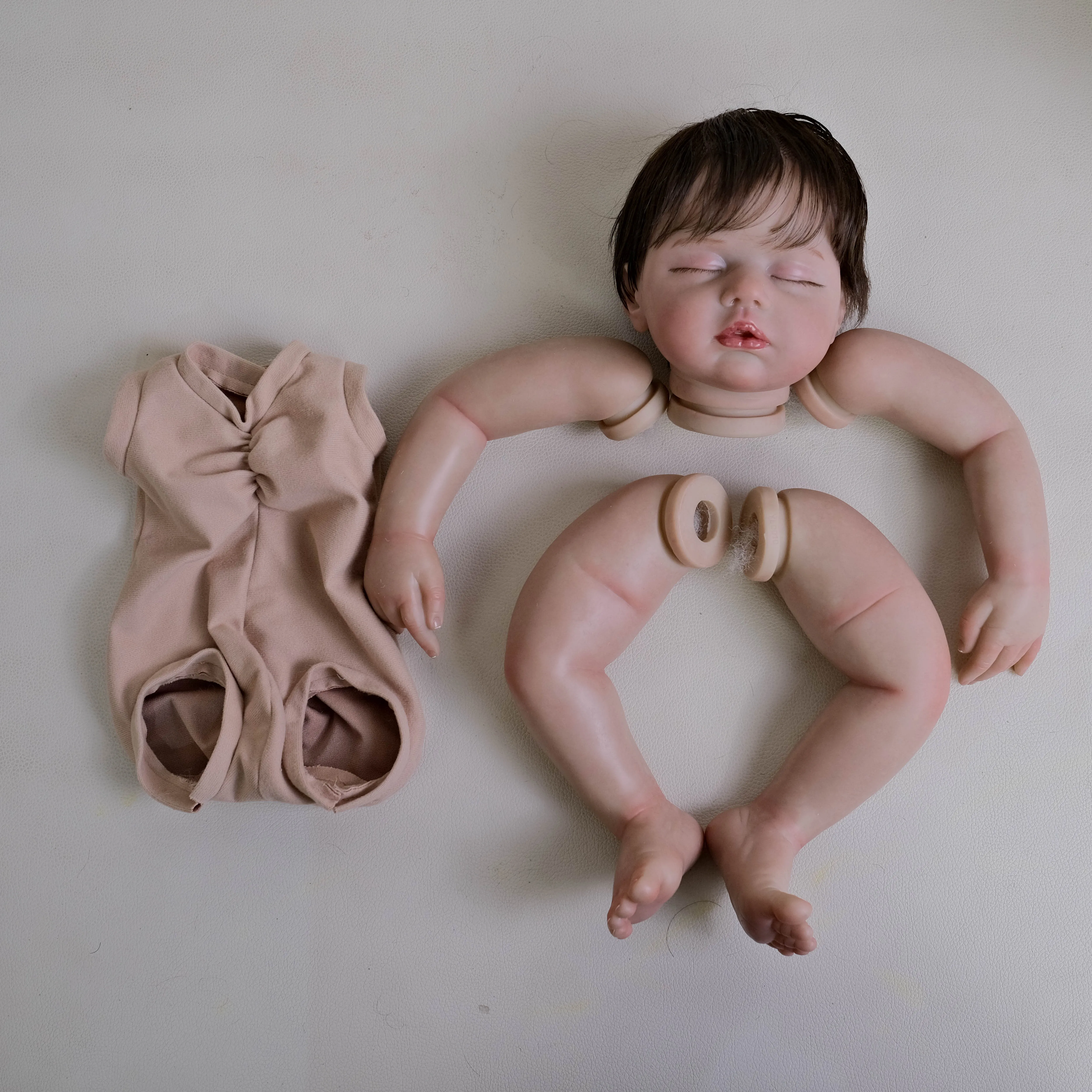 NPK 19inch Zoey Unfinished Painted Doll Kit Reborn Doll Parts with Hand Rooted Brown Hair Lifelike Doll for Collectors