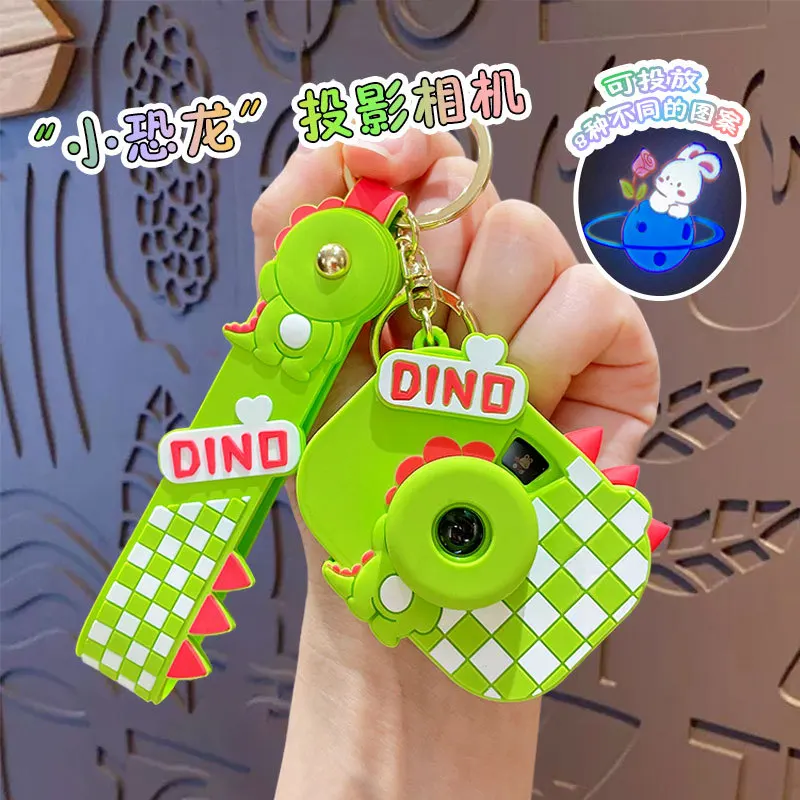 Cute Cartoon Dinosaur Camera Keychain Fashion Grid Mini Projector Camera Key Chain Backpack Accessory for Couple Women Kids Toys