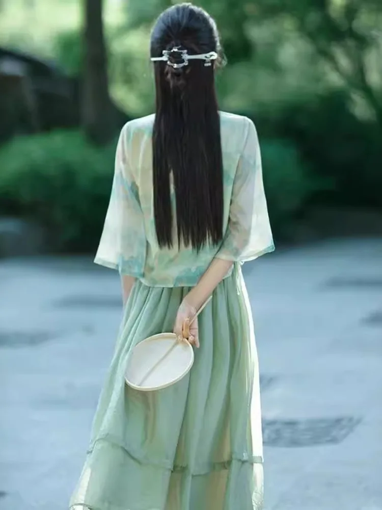 بلوزة نصف كم بياقة مندرين مطبوعة بالحبر مع تنورة شبكية عالية الخصر لأداء الرقص الكلاسيكي