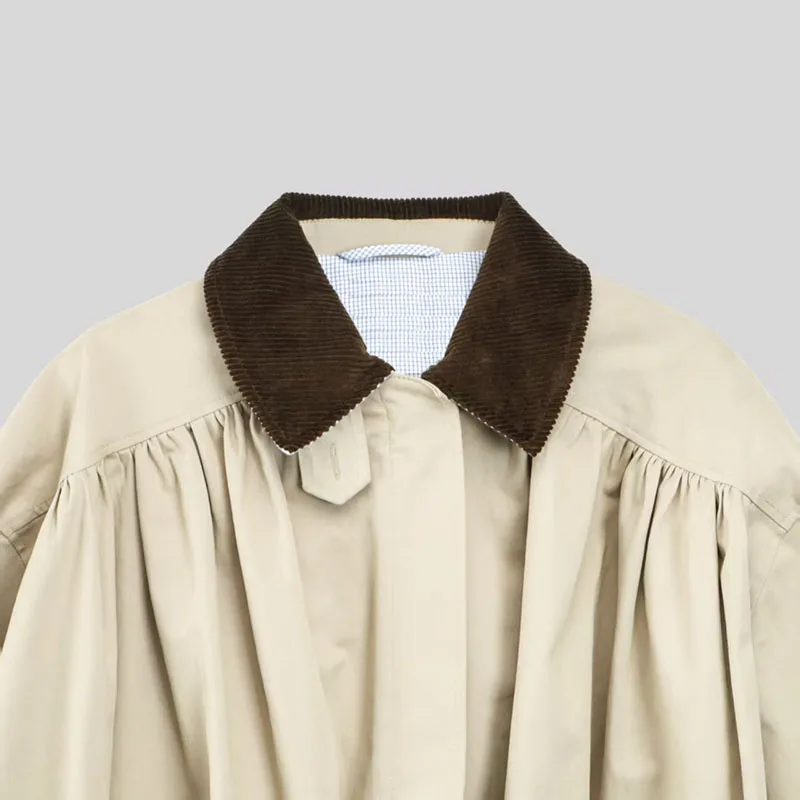 

Нейтральный стиль в стиле ретро, с лацканами и вельветовой курткой свободного и элитного образца для женщин.