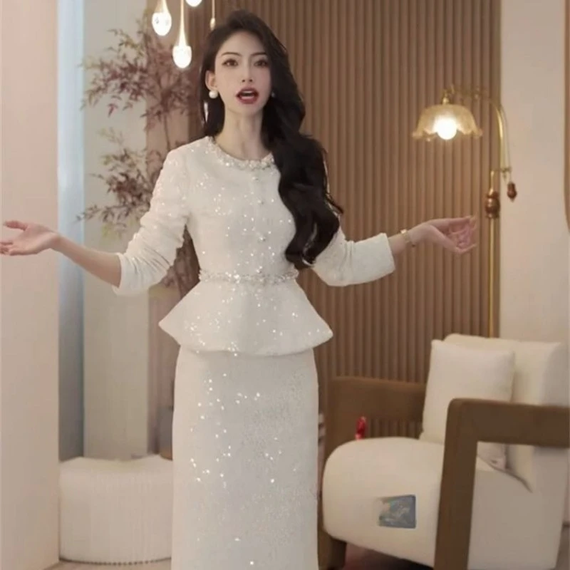 

New High Quality Autumn Women's Suit Fashion Sequined Beaded Slim Long Sleeve Top + Elegant Skirt Solid Color Skirt Set