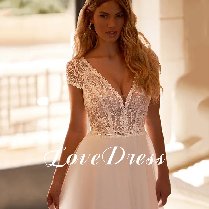 Vestido de novia bohemio de tul, corte en A, Sexy, con escote en V profundo, espalda descubierta, encaje plisado, manga corta, cola larga, vestido de novia personalizado