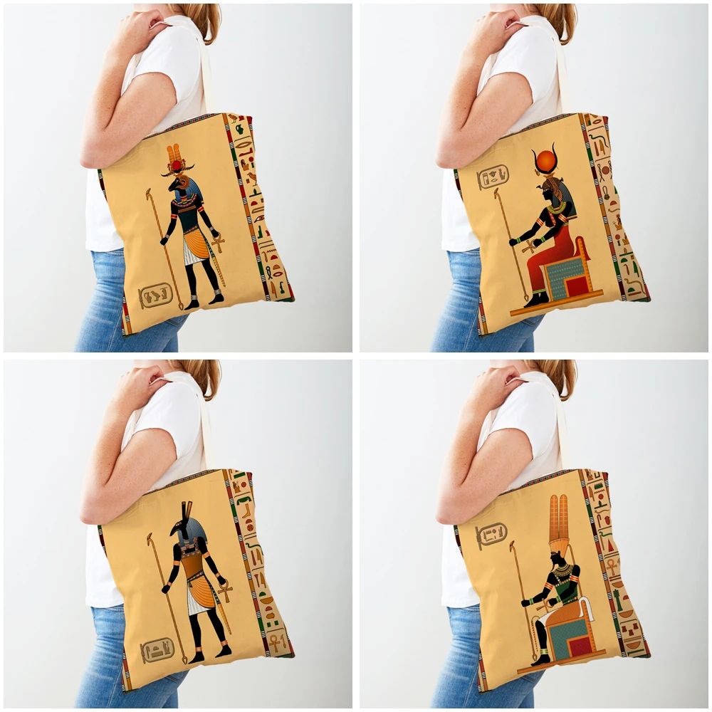 Bolsos de compras del faraón del tótem del Antiguo Egipto, bolso de compras de lona informal, bolsos de mano de viaje reutilizables de dibujos animados de Anubis para mujer