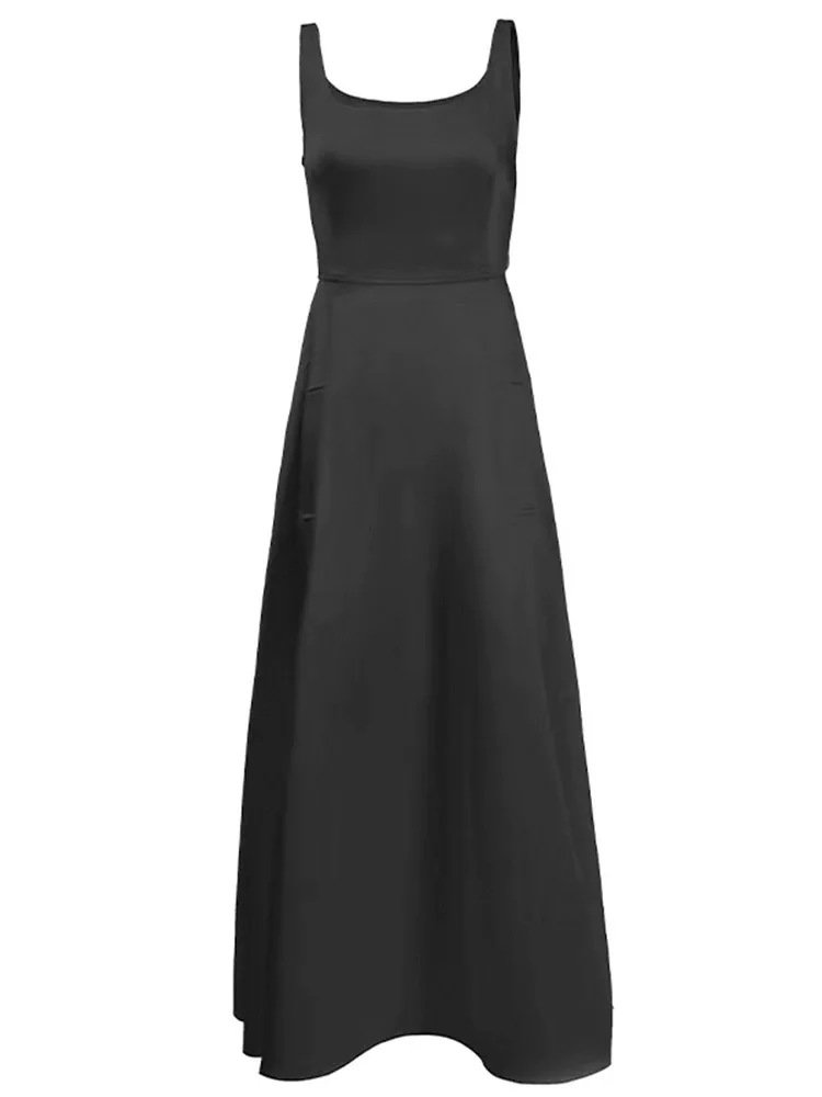 B-033 Falda larga 2025 Nuevo vestido de tirantes de estilo occidental con encanto exquisito estilo hermana de vacaciones junto al mar