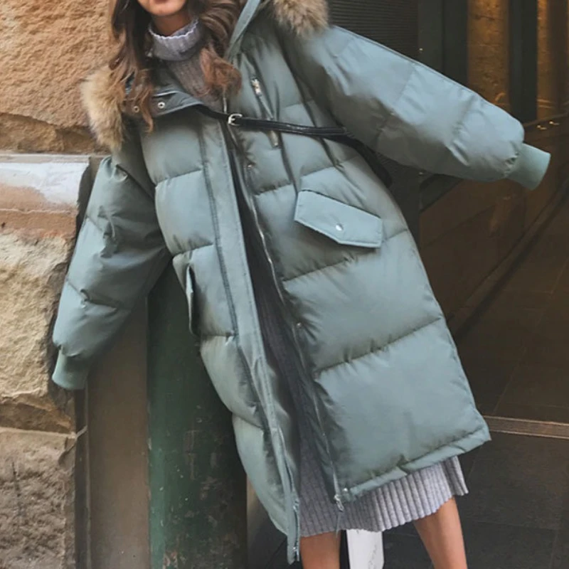 

The 2025 Winter Cotton-padded Jacket Women's Commuting Style Long Korean Loose Thick Coat
