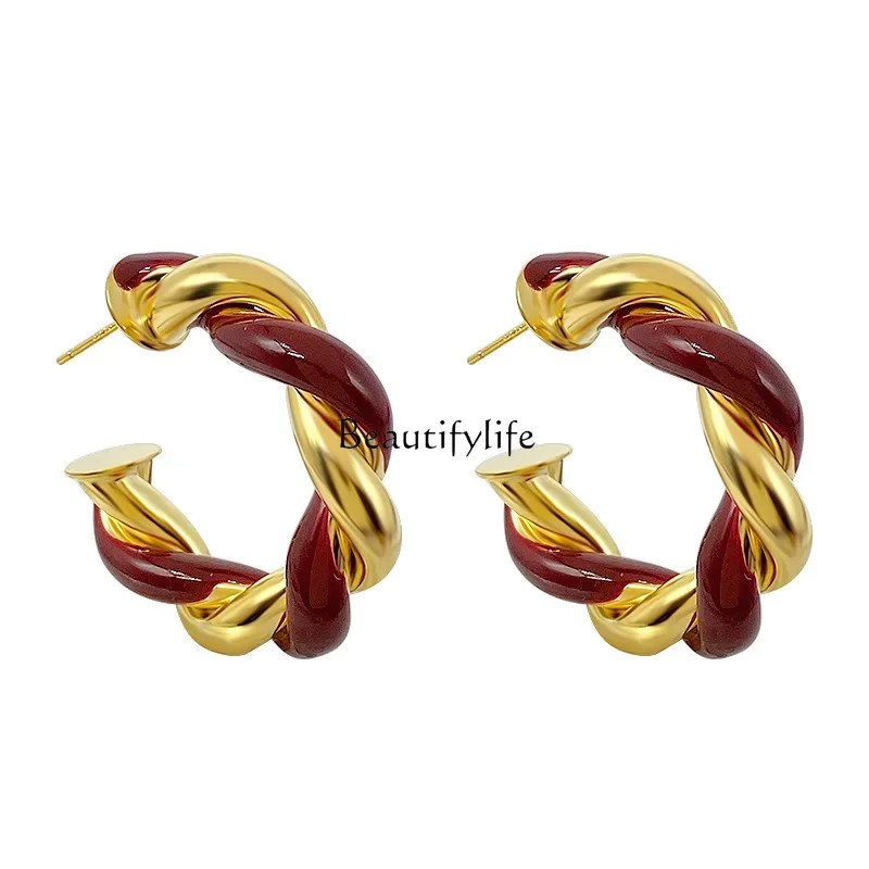 

European and American exaggerated fashion twist woven winding earrings, unique design sense, personalized earrings