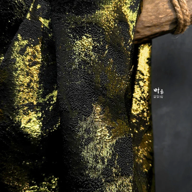 gold three-dimensional relief on a black background, autumn and winter dark wind jacquard jacket fabric, short skirt designer