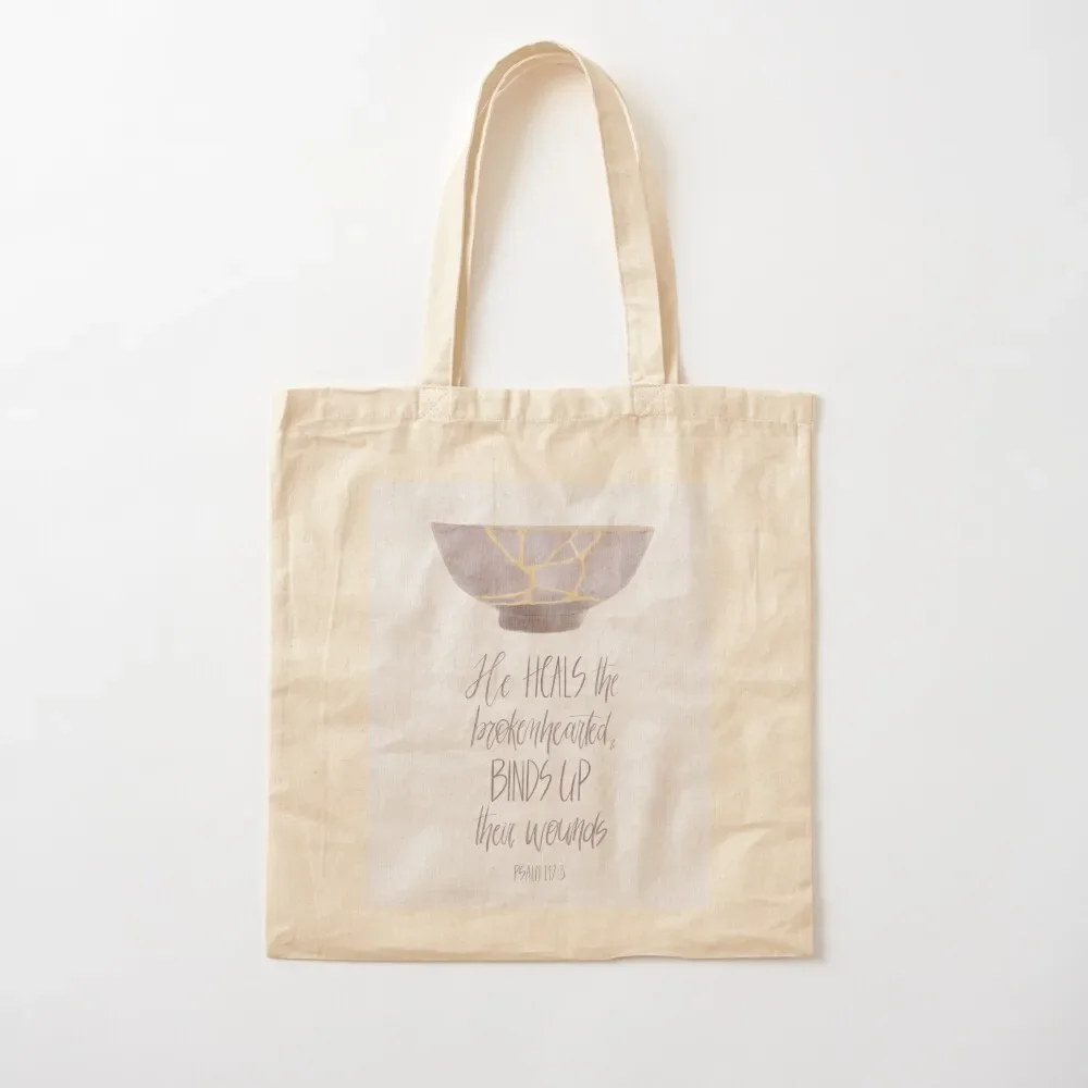 

He heals the brokenhearted and binds up their wounds - Psalm 147:3 Tote Bag sac pour femme Canvas