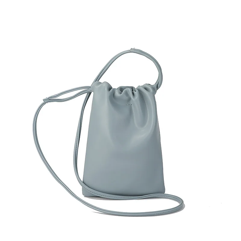 

Fashionable and simple mobile phone bag, small lucky bag, can be carried on one shoulder or crossbody. Simple drawstring bucket