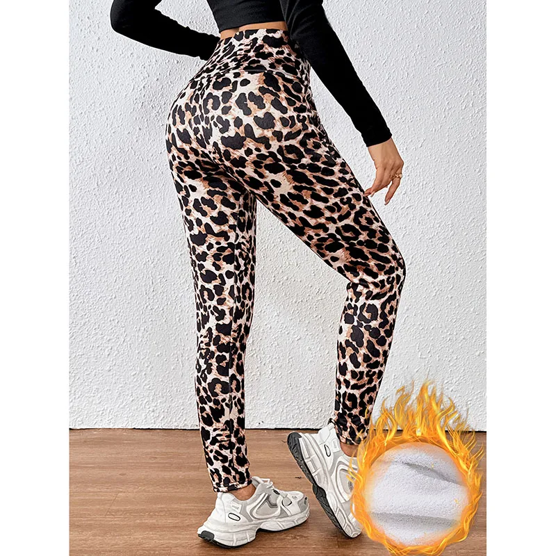 Mallas cálidas de lana de cordero para mujer, mallas con bolsillo con estampado de leopardo a la moda, pantalones de Yoga de terciopelo gruesos de cintura alta para invierno