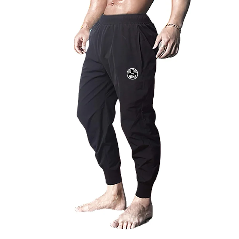 Muscleguys Fitness Running Training Sport Quick Dry Gym Bodybuilding Beam Mouth Casual Trousers with Pockets