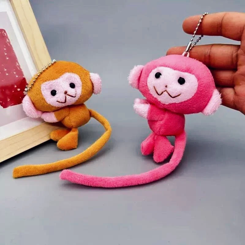 Cartoon-Rosa-Plüsch-Schlüsselanhänger, süßer Affe mit langem Schwanz