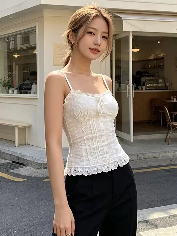 Cute white lace embroidered camisole with front tie, waist button closure, pleats, and ruffled fitted design