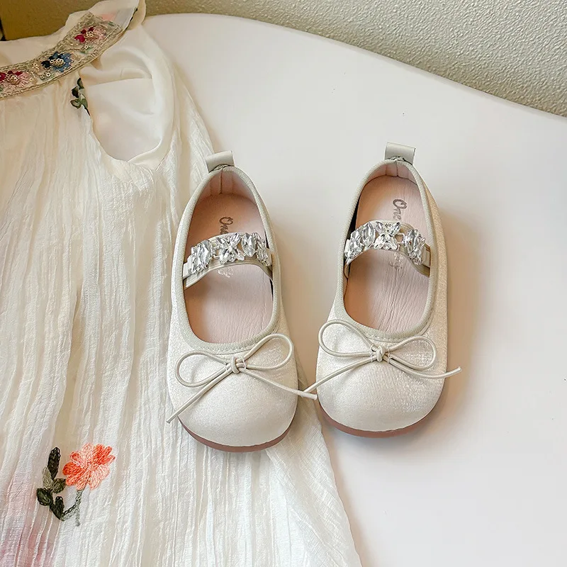 

Весенние детские балетки с бантом и эластичной лентой, с круглым носком, для девочек, в стиле принцессы, фиолетовые, бежевые, с кристаллами, элегантные