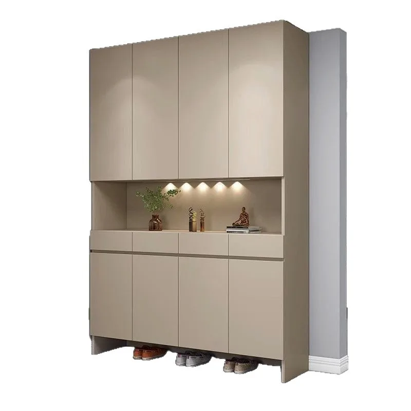 integrated stool against the wall at the entrance of the home, coat cabinet can be seated into the entrance hall