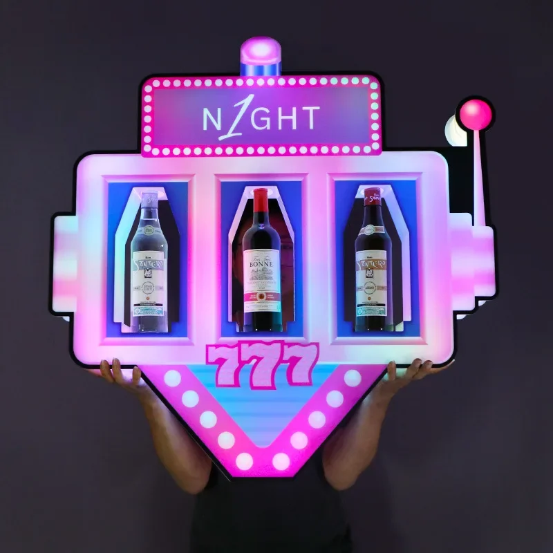 The bar is illuminated, holding three signs, containing champagne, foreign wine, acrylic wine racks, wine shelves