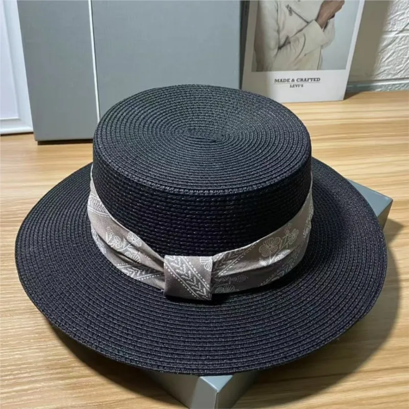 

A fashionable flat-topped hat with ink-wash printed webbing versatile casual sunshade for women and an outdoor