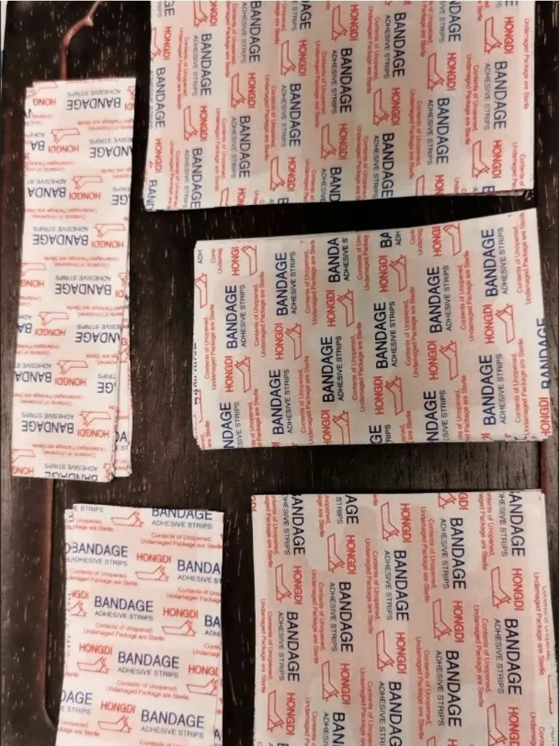 

100 шт., дышащие водонепроницаемые бинты, клейкие пластыри для ран, гемостатические пластыри, лента для перевязки для оказания первой помощи, экстренная перевязочная лента