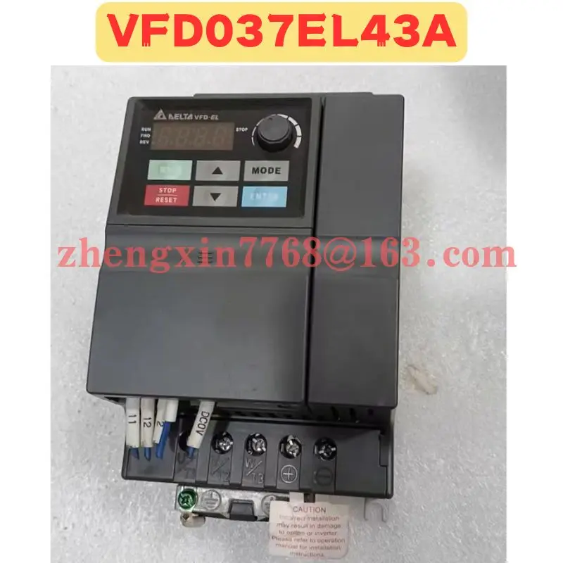 

Used Frequency Converter VFD037EL43A Normal Function Tested OK