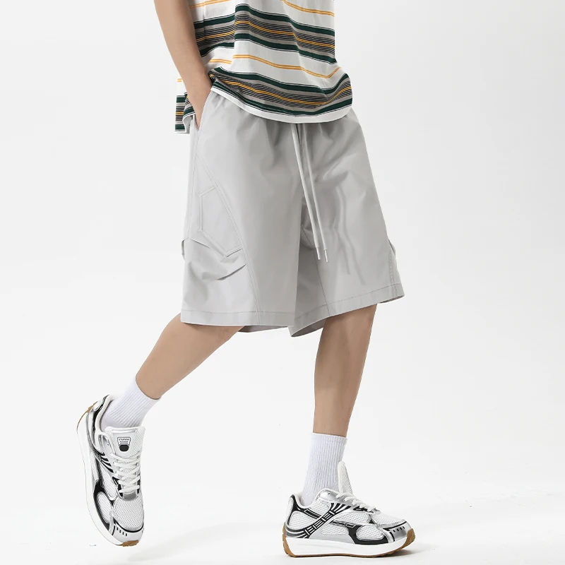 

Мужские быстросохнущие шорты для бега с эластичным поясом на шнурке, дышащие, однотонные, размеры M-5XL - Модные свободные шорты 2026 года