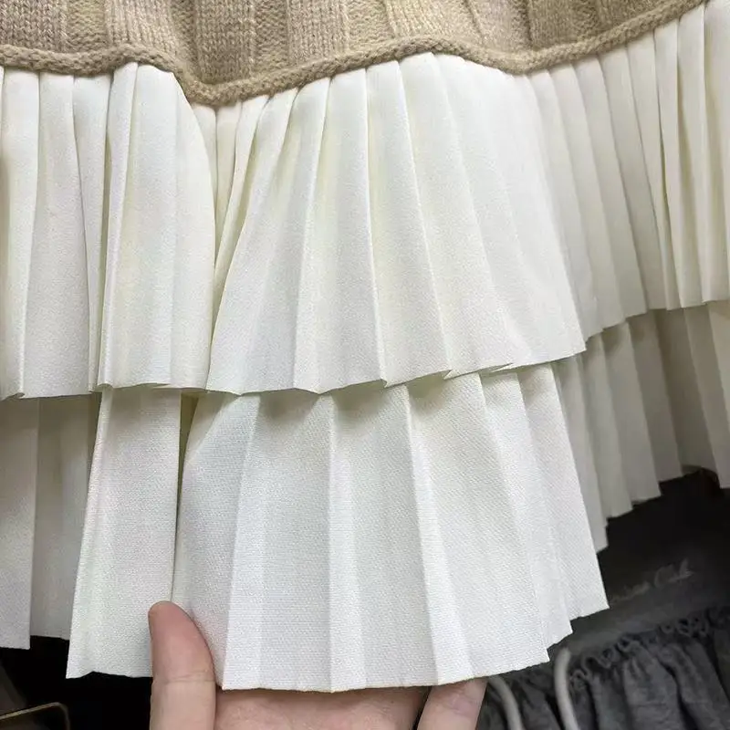 Menina quente emendado saia curta outono e inverno nova cintura elástica a linha de cintura alta bolo saia plissada saia pequena