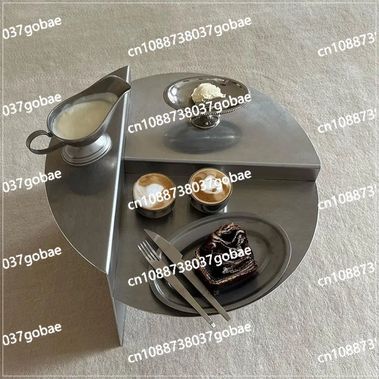 

Stainless steel coffee table wabi sabi wind round metal coffee table