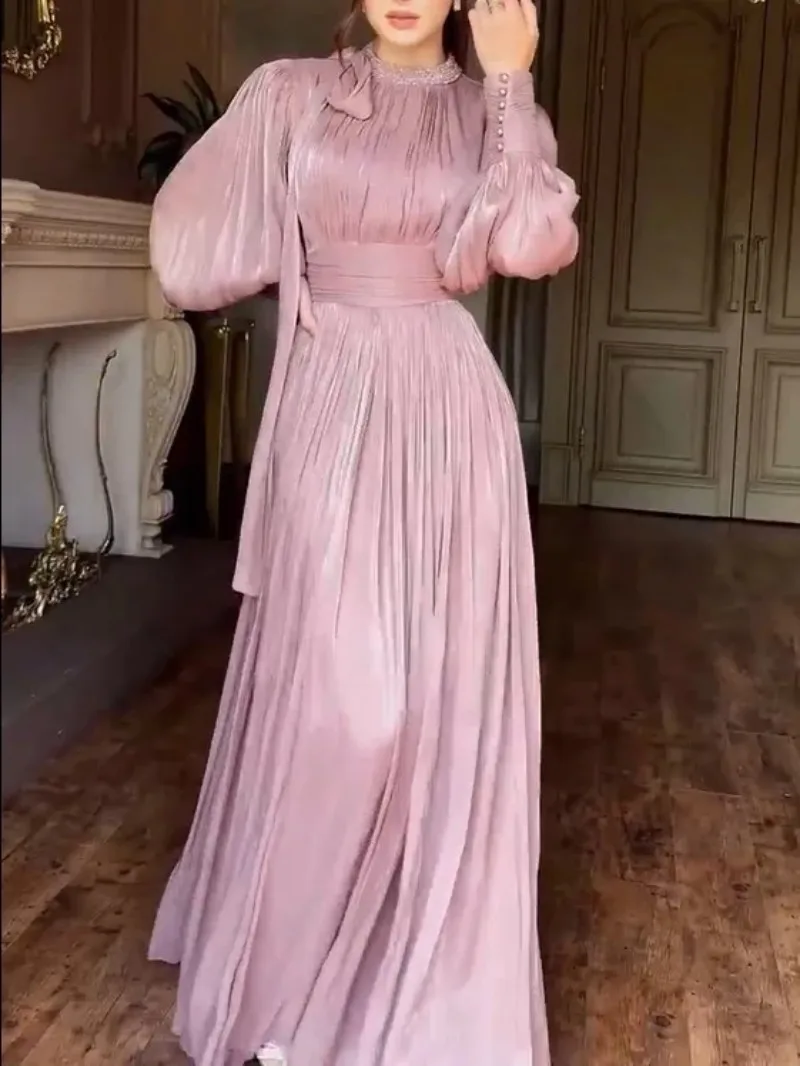 New Autumn and Winter Styles for Women. A Long Evening Dress with Hot-fixed Rhinestones, A Cinched Waist and Tie Straps.