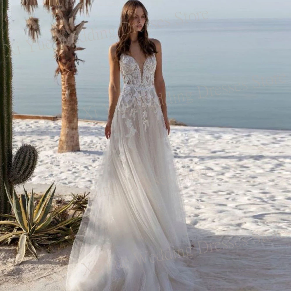 

Graceful Charming A Line Women's Wedding Dresses Appliques Lace Bride Gowns Backless Spaghetti Straps Beach فساتين حفلات الزفاف