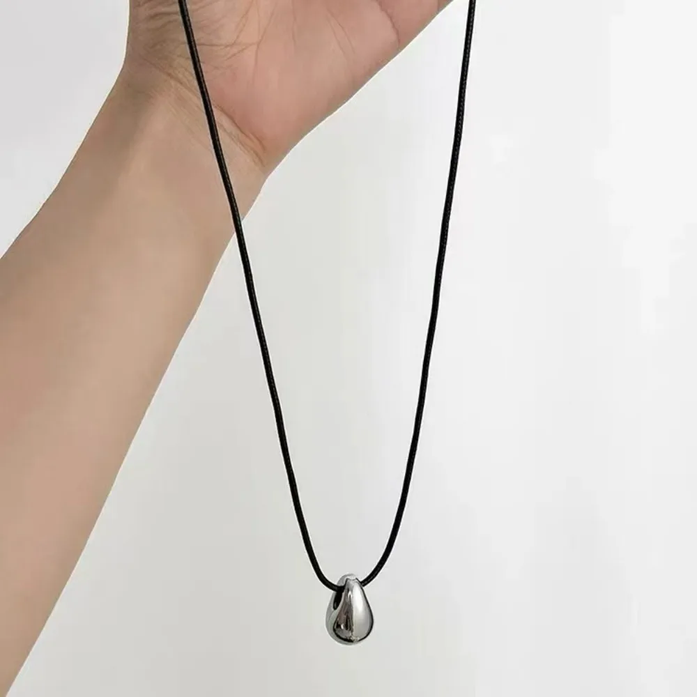 

New Trendy Minimalist Cold Style Metal Glossy Water Drop Black Leather Rope Necklace Adjustable Autumn Sweater Chain for Women
