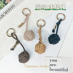 New Woven Pendant Leather Spherical Keychain Hand Woven Ball Metal Buckle Bag Pendant Couple Gift