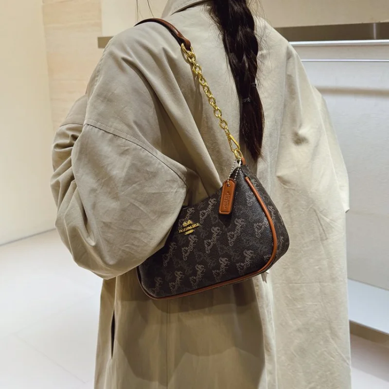 

Elegant Ladies Handbag Crafted From Sun-Patterned Leather Featuring Elegant Casual Vintage Style