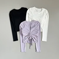 Exquisito top deportivo sexy con espalda descubierta para mujer, con almohadillas en el pecho, traje de yoga con cordón ajustable para fitness y pilates, de manga larga y corte ajustado.