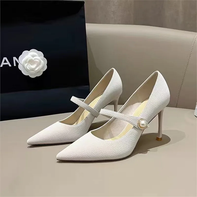 

Black stiletto high heels women's new spring and summer one-word with pearl versatile pointed temperament single shoes