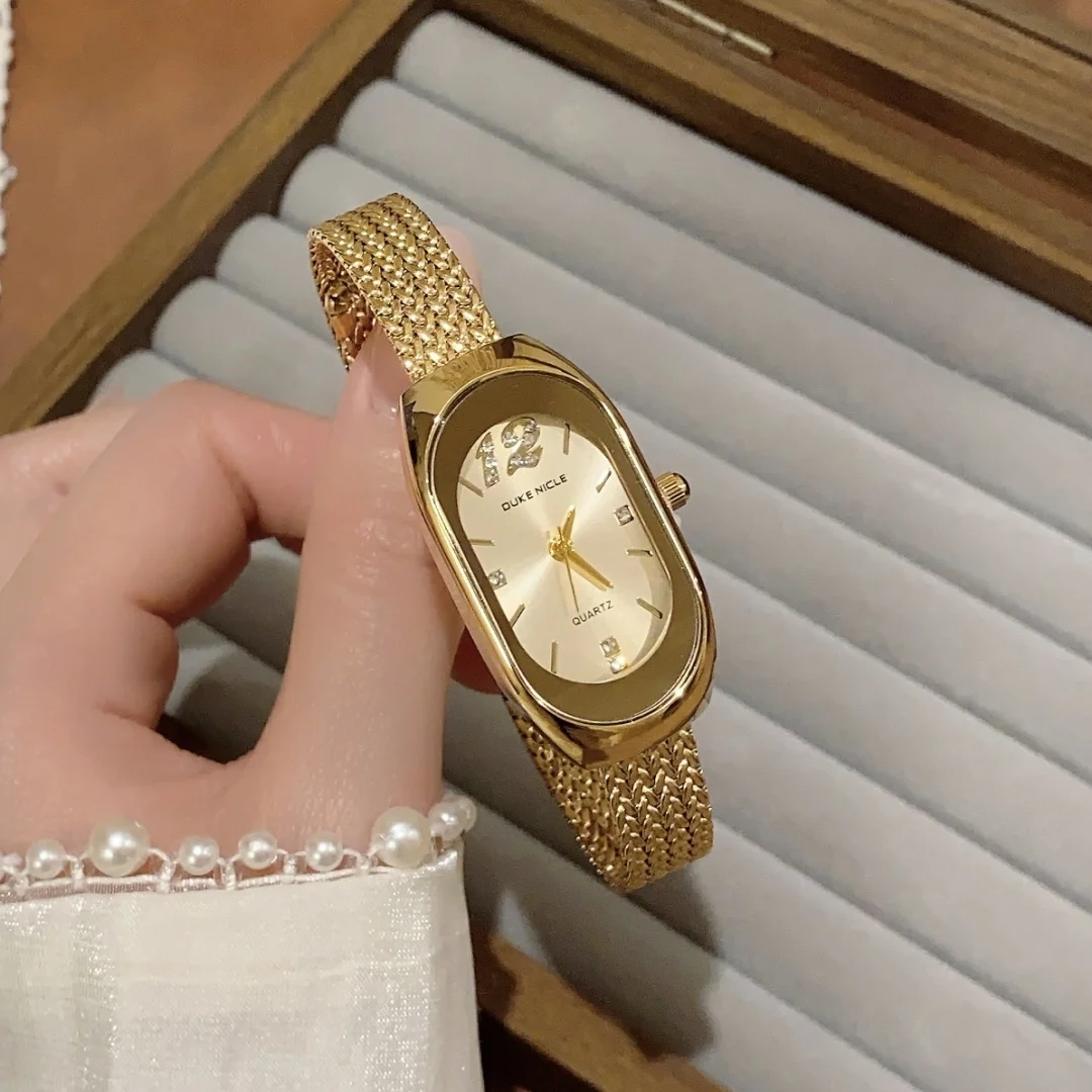 ساعة كوارتز بسيطة للنساء بحزام من الفولاذ المقاوم للصدأ بمينا بيضاوي وساعة يد للطالبات وساعات يد ذهبية للسيدات Relogio