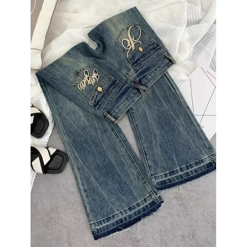 

American retro low-waisted jeans female autumn new embroidery old casual fashion temperament slim Joker bell bottoms.