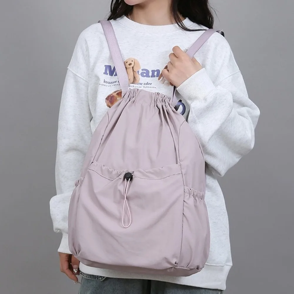 حقيبة ظهر كاجوال بلون سادة للسفر على الطراز الكوري برباط من النايلون بسعة كبيرة وخفيفة الوزن حقيبة مدرسية للطلاب للرجال