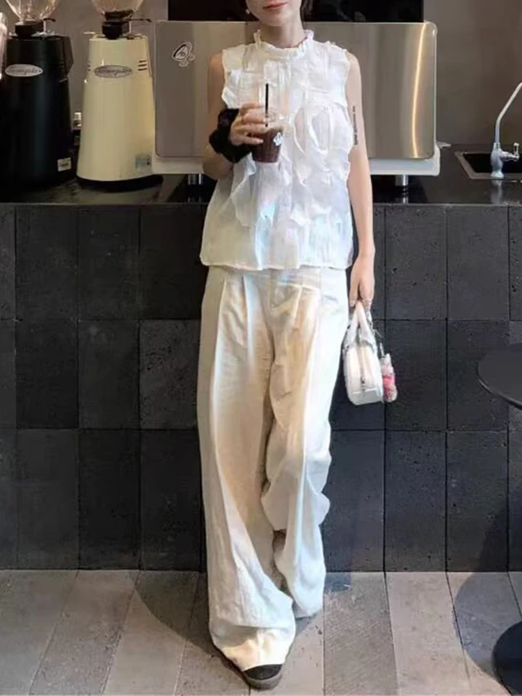 

European style new women's fashion versatile temperament solid color ruffled sleeveless vest top loose shirt