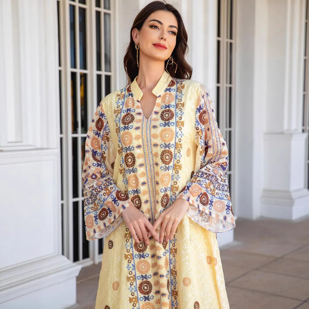 

Middle Eastern Muslim Women's Abayas: Dubai-style Premium Embroidered Fabric Printed Dresses with Rhinestone Embellishments.
