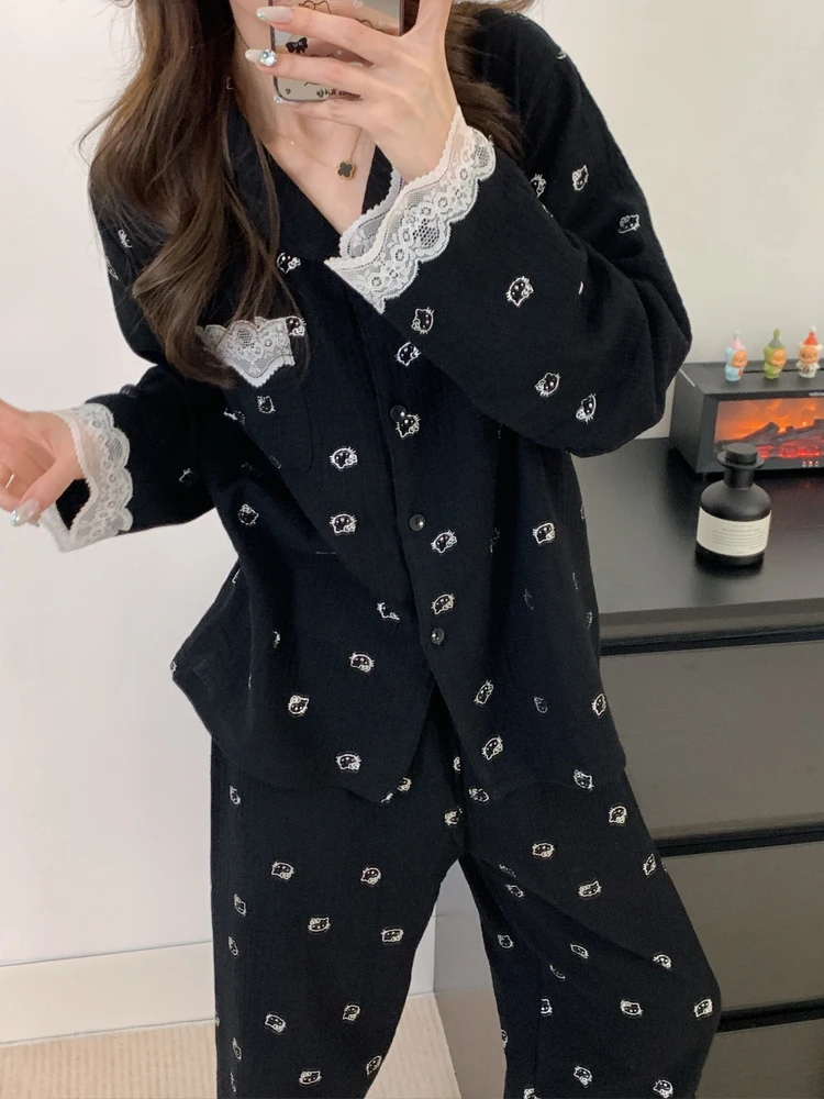 見事なレースの寝間着女性の長袖黒のホーム服は屋外でも着用可能春秋の新しいスタイルの漫画猫デザイン