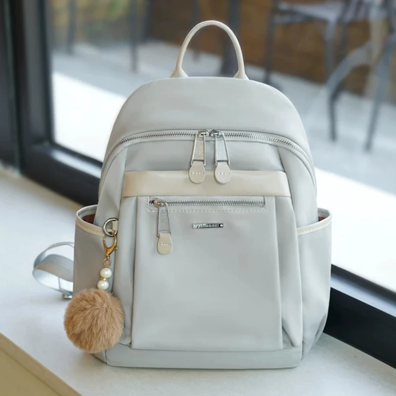 Fashionable and casual large capacity travel lightweight Oxford cloth backpack for women's high-end luxury versatile backpack