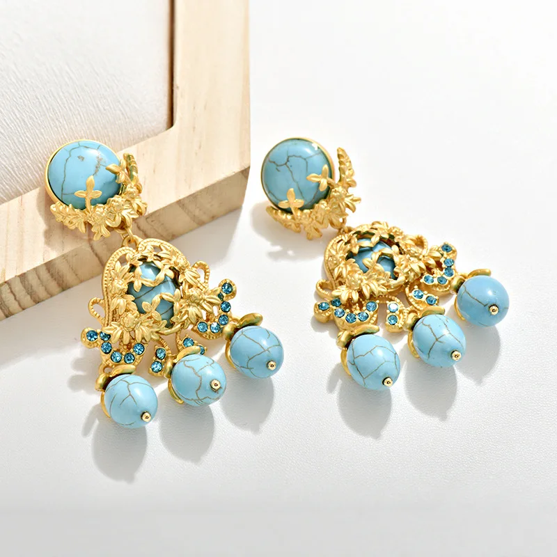 

Classical and Fashionable Hollow Flower Turquoise Tassel Women's Earrings with Personalized Retro Accessories