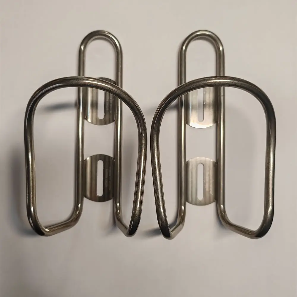 

Ultralight Titanium Bicycle Water Bottle Cage Includes Free Titanium Bolts for Road Bike & Mountain Bike Riding