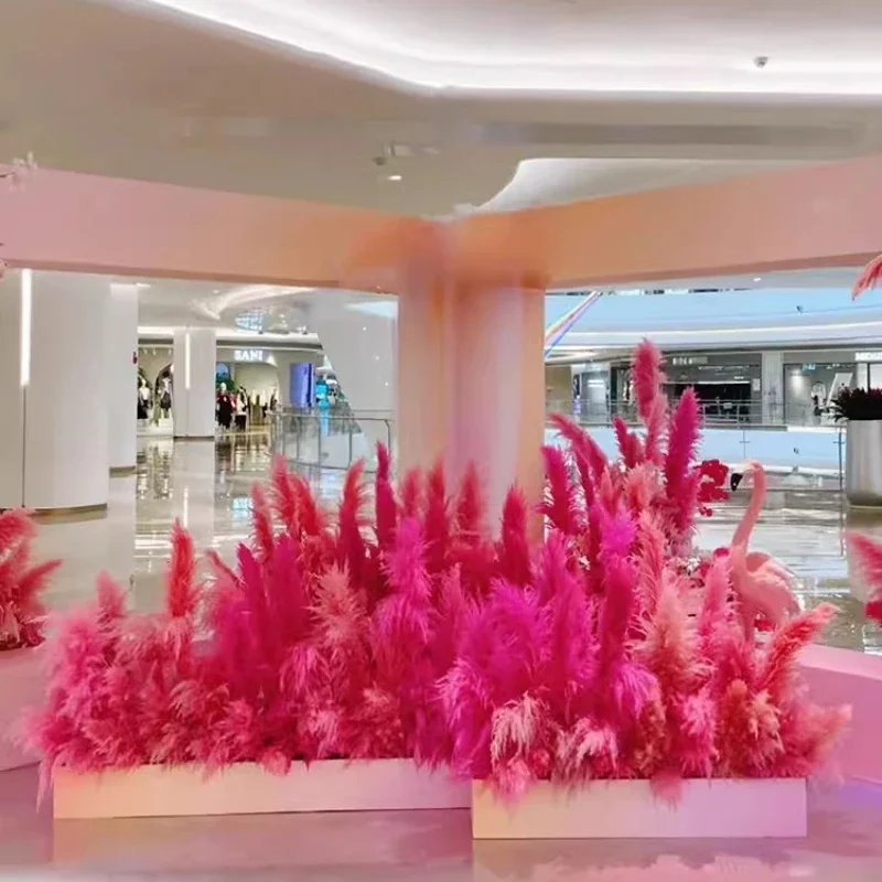 Pink reed simulation green plant dog tail grass shopping mall clock in photo decoration scene atmosphere layout interior