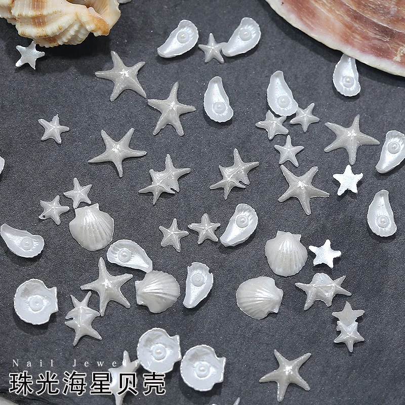 50 ชิ้น ของตกแต่งเล็บเรซิ่นรูปปลาดาวเปลือกหอยมุกสีขาวมุกประกาย น่ารัก สไตล์โอเชียน สำหรับตกแต่งเล็บ