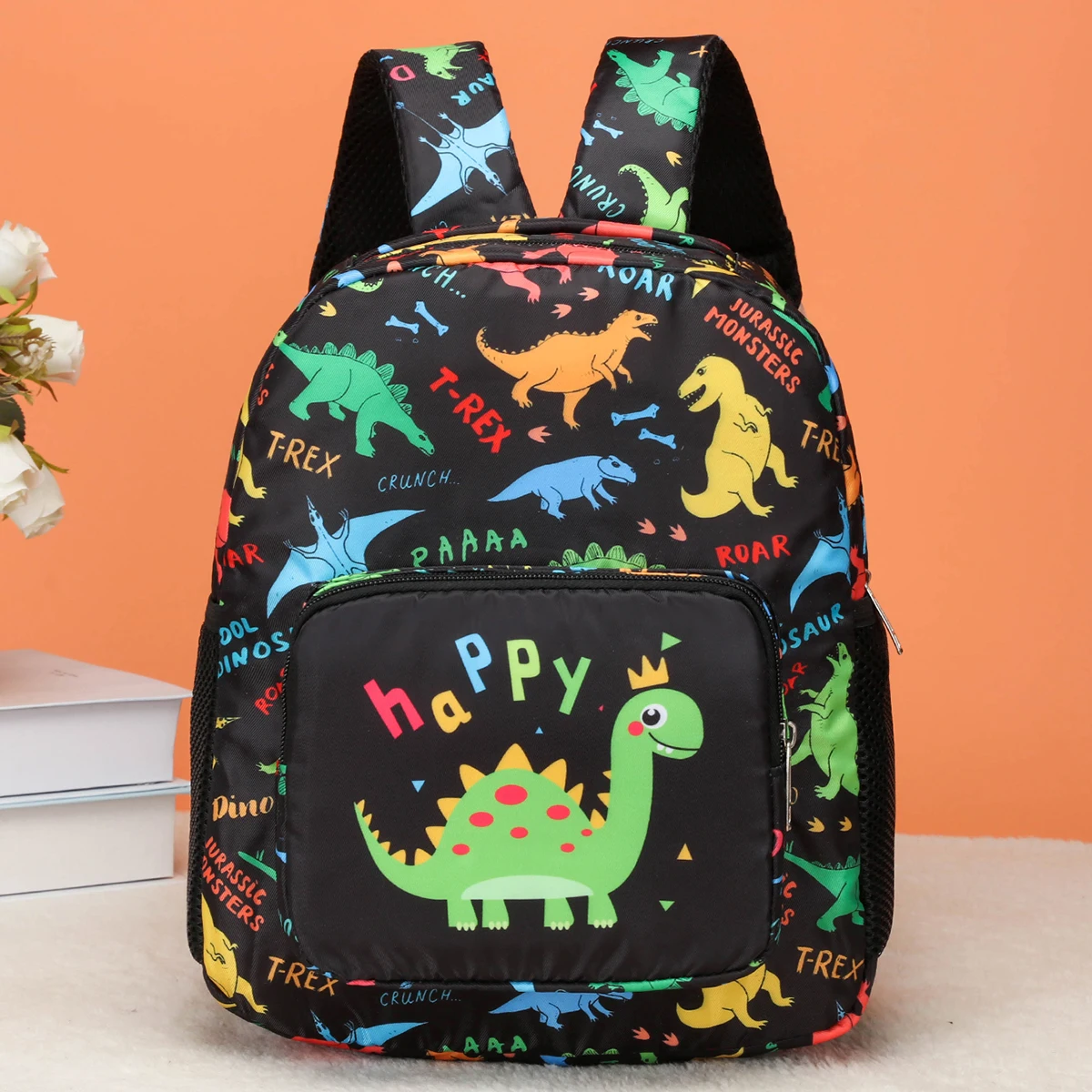 

Cute cartoon dinosaur print backpacks with all-over dinosaur patterns and letter dinosaur prints, suitable for boys and girls