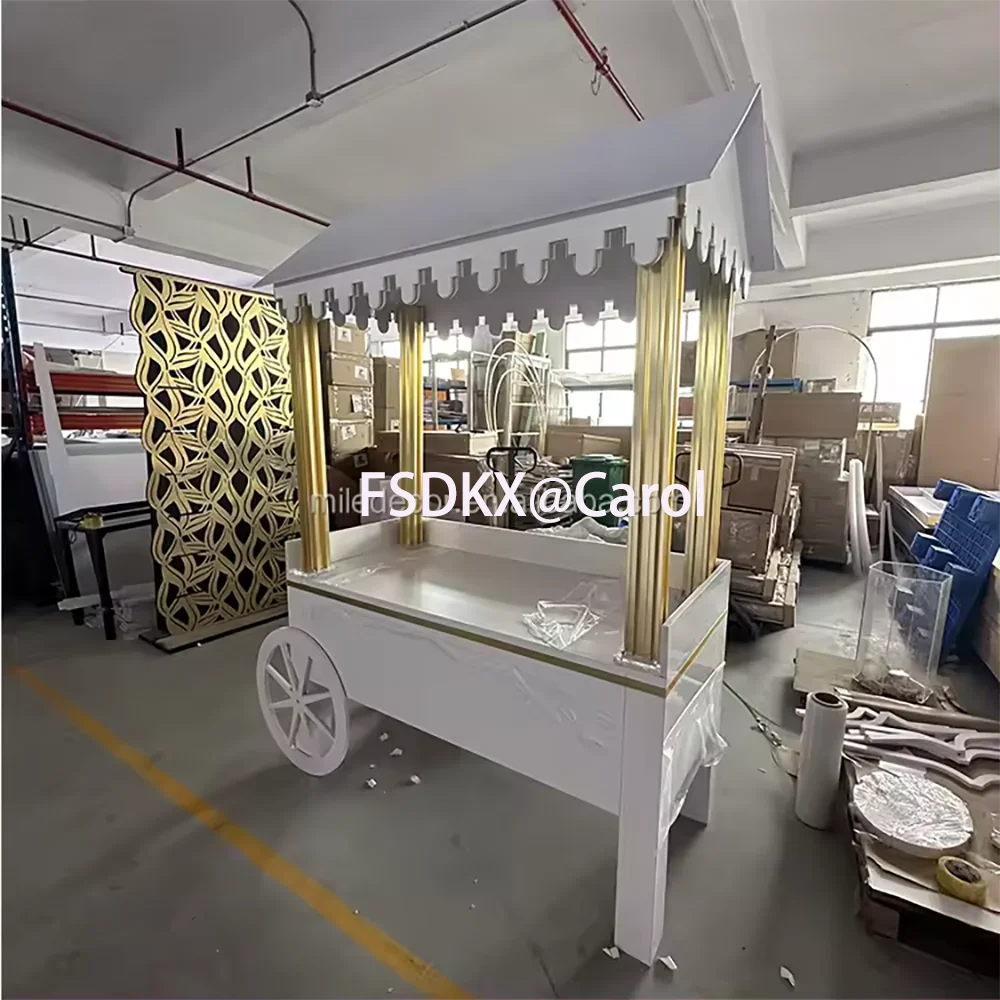 

Shiny Golden Frame Stainless Steel Display Cart White Acrylic Food Candy For Wedding Decoration