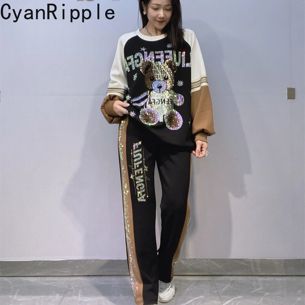 

Весенний женский комплект из двух предметов в стиле колорблок: пуловер с длинным рукавом из хлопка с термостразами + повседневные прямые брюки на резинке