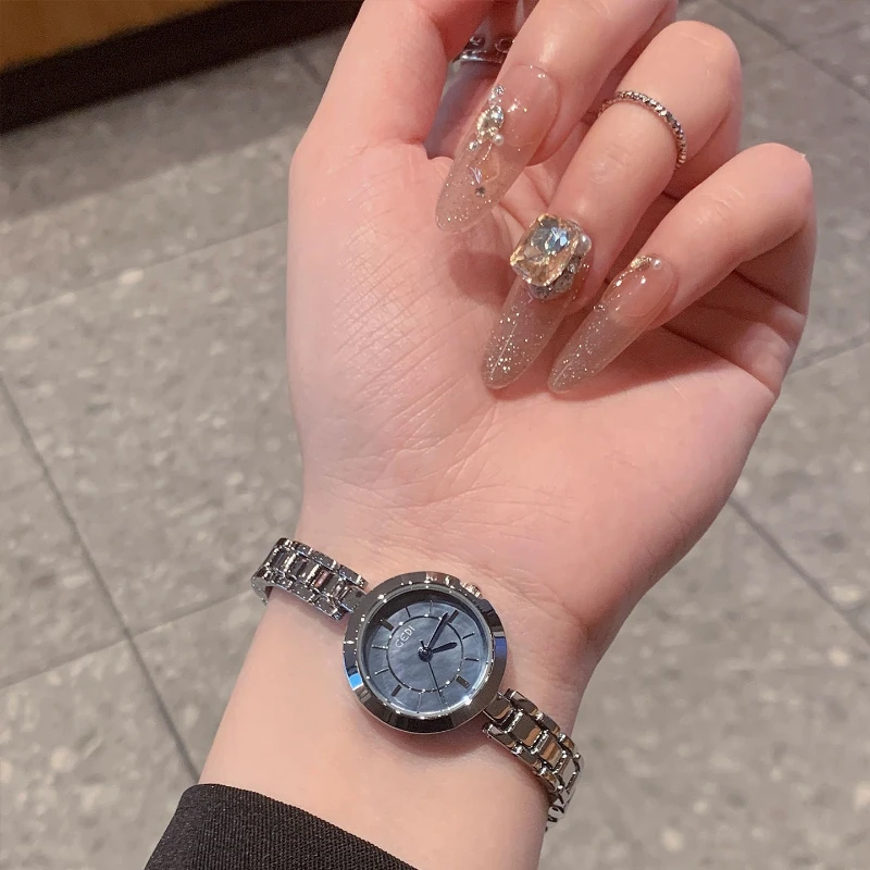 

Fashion student trendquartz watch simple water release elegant light luxury niche steel belt women's watch new2025 birthday gift